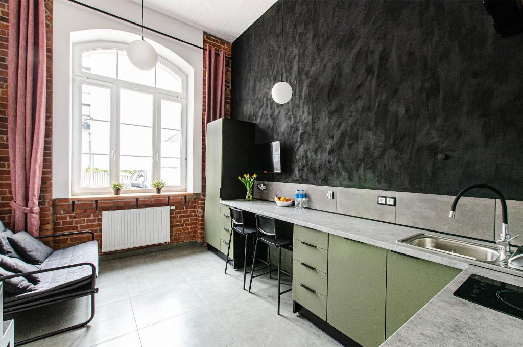 Kuchyňa alebo kuchynka v ubytovaní Smart Rental Management Apartments - CITY CENTER