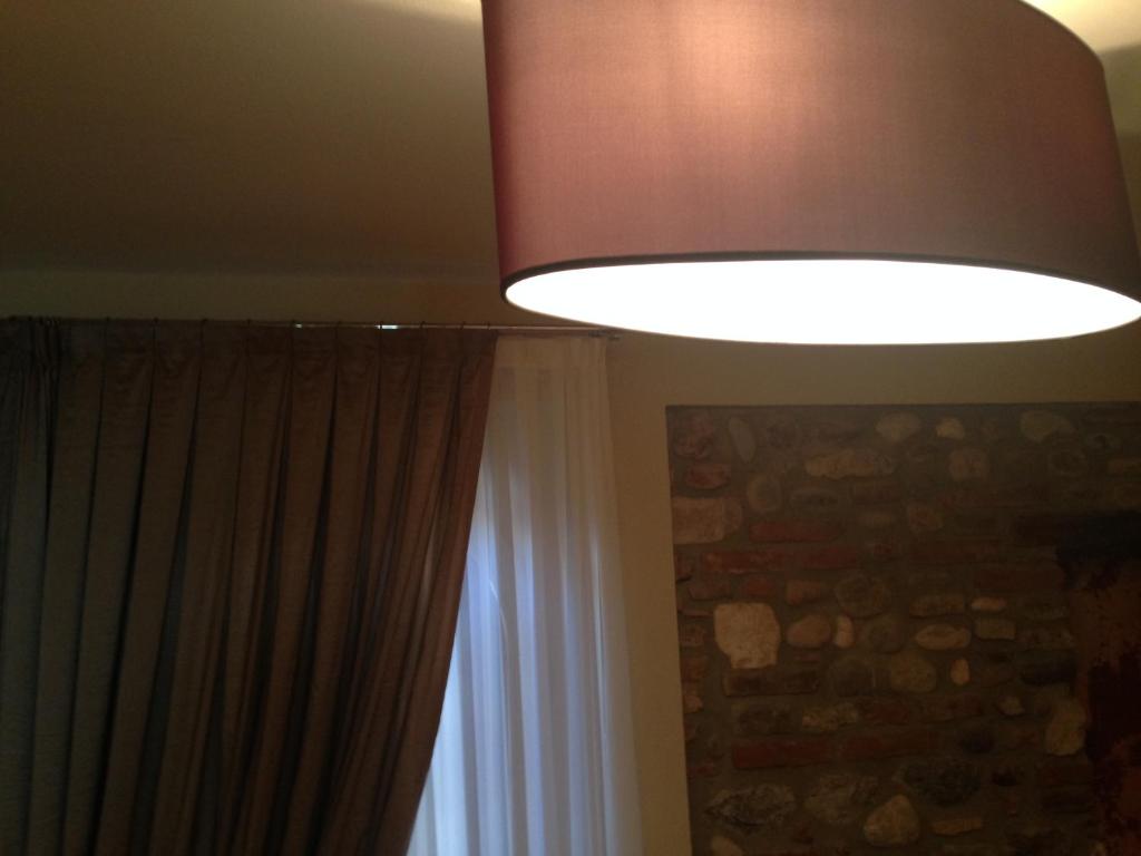 Fotografia z galérie ubytovania Oreste Suite v destinácii Lazise