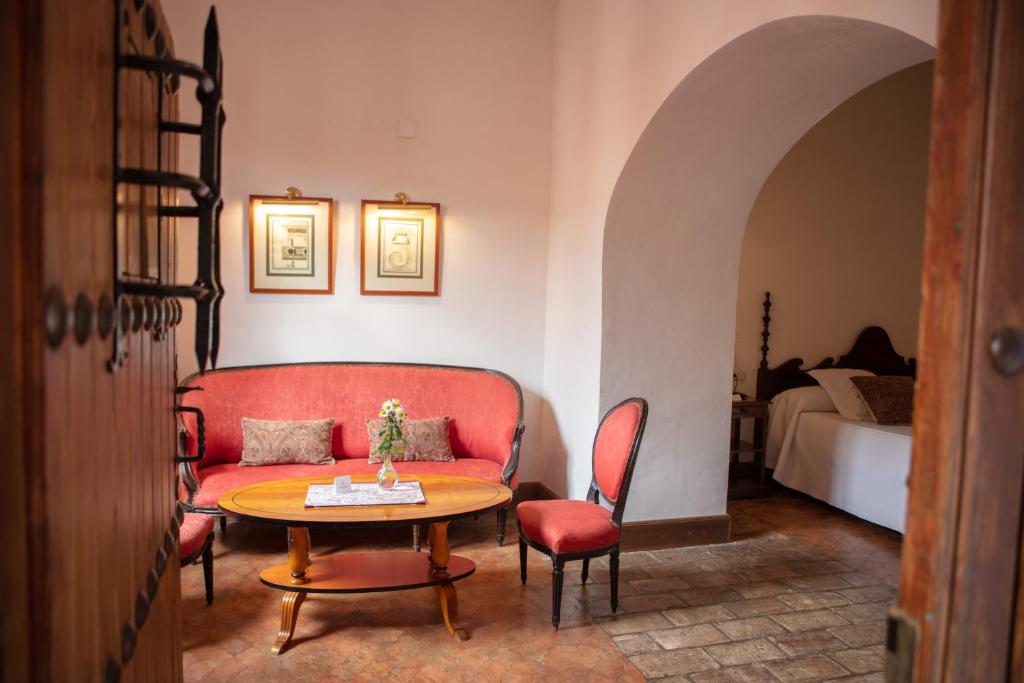 Postel nebo postele na pokoji v ubytování Monasterio de San Francisco