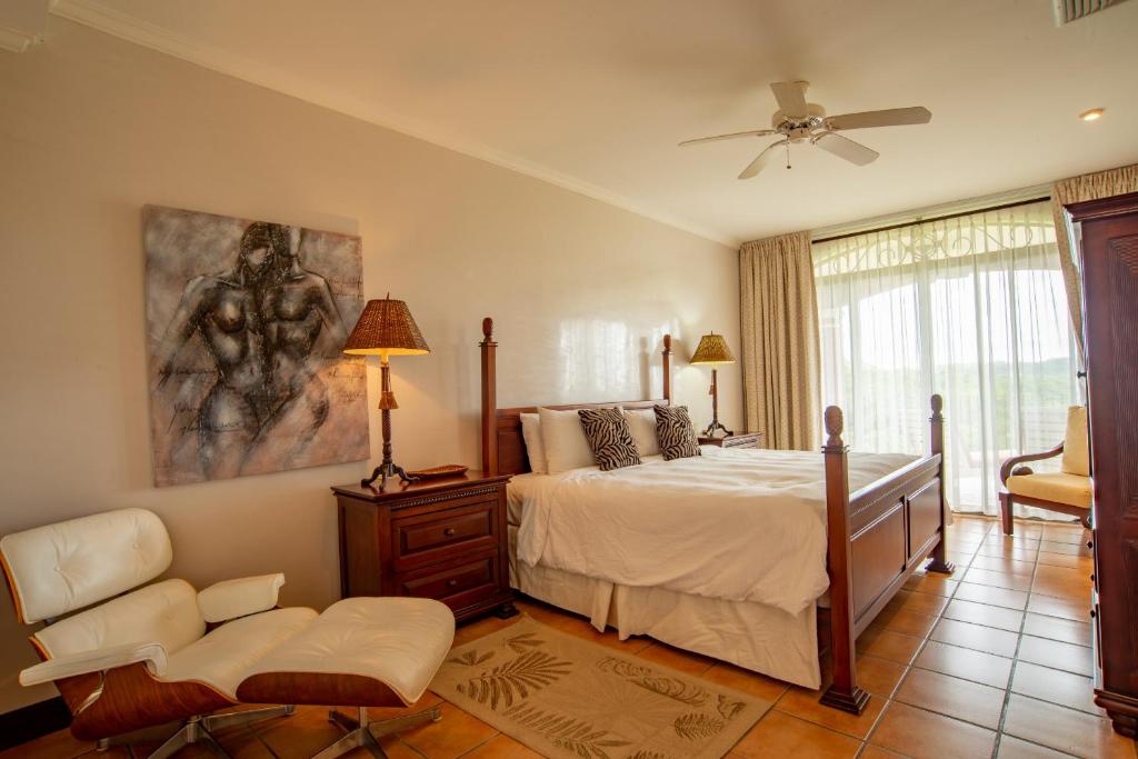Postel nebo postele na pokoji v ubytování Bougainvillea 8211 Luxury Apartment - Reserva Conchal