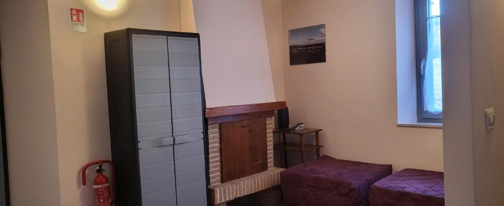 Postel nebo postele na pokoji v ubytování Apartment Nonna Delia