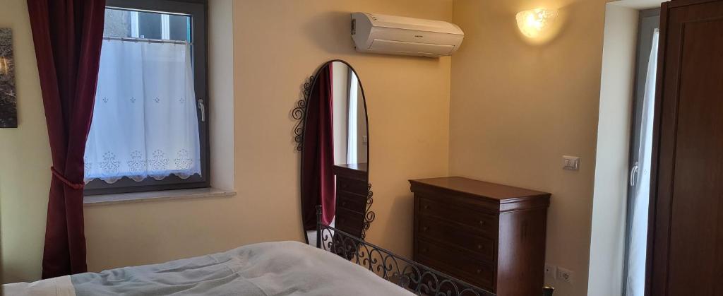 Postel nebo postele na pokoji v ubytování Apartment Nonna Delia