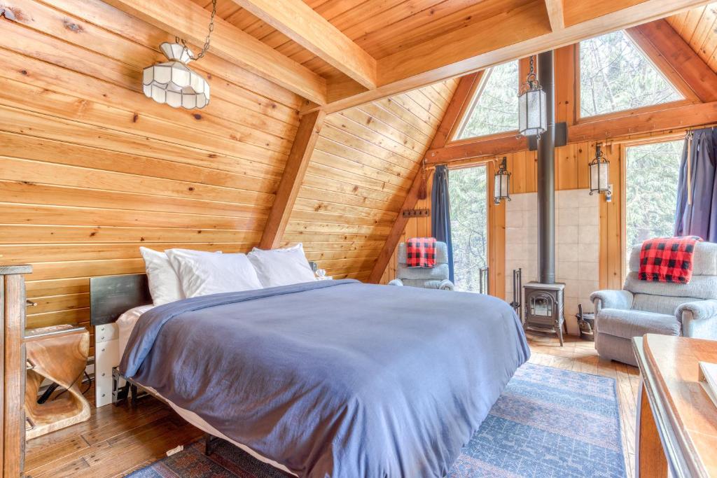 Postel nebo postele na pokoji v ubytování Chalet Shangri-La