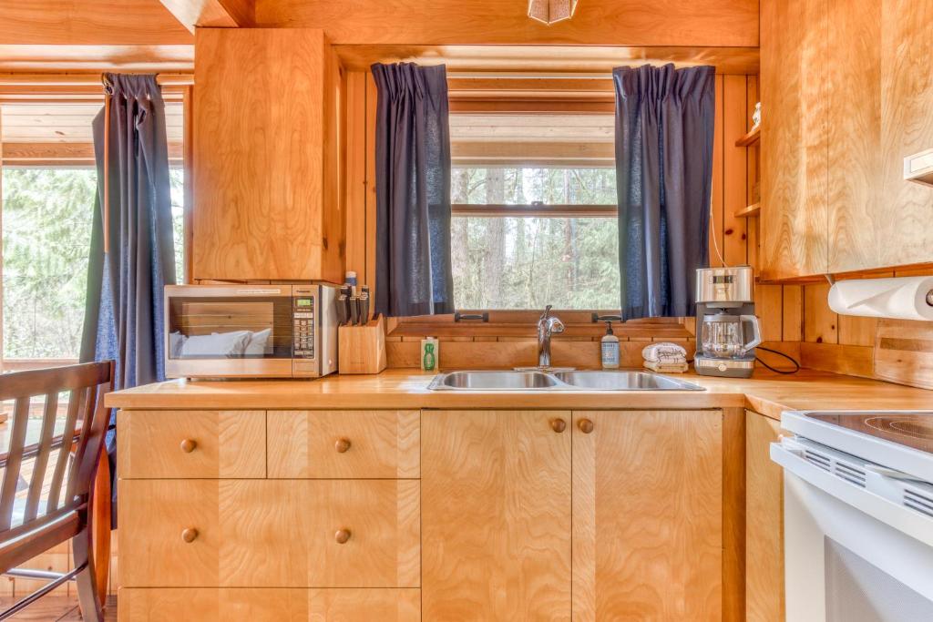 Kuchyň nebo kuchyňský kout v ubytování Chalet Shangri-La