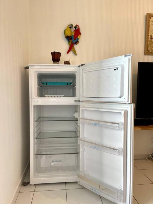 Kuchyň nebo kuchyňský kout v ubytování Appartement vue mer