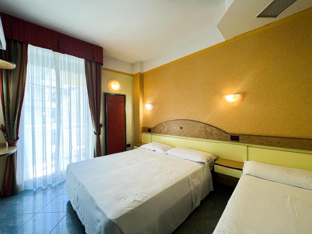 Postel nebo postele na pokoji v ubytování Hotel Soleblu