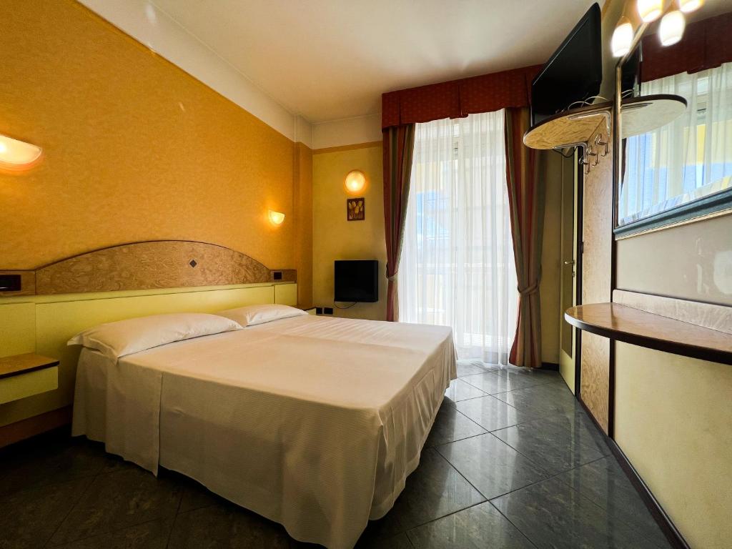 Postel nebo postele na pokoji v ubytování Hotel Soleblu