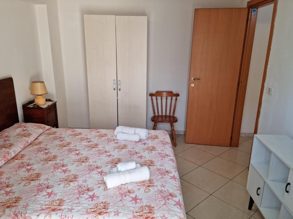 A bed or beds in a room at Via Pasquale Testa