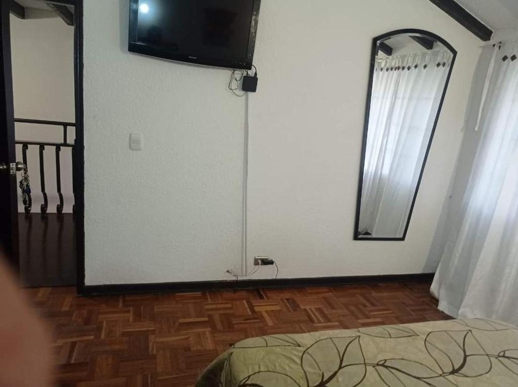 TV a/nebo společenská místnost v ubytování Hotel Bogotá Calle 100
