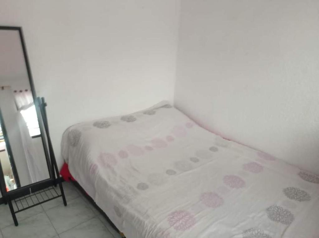Postel nebo postele na pokoji v ubytování Hotel Bogotá Calle 100