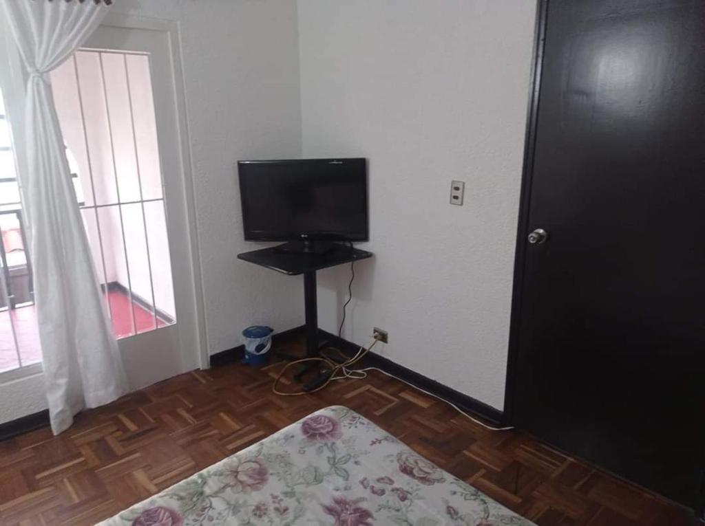 TV a/nebo společenská místnost v ubytování Hotel Bogotá Calle 100