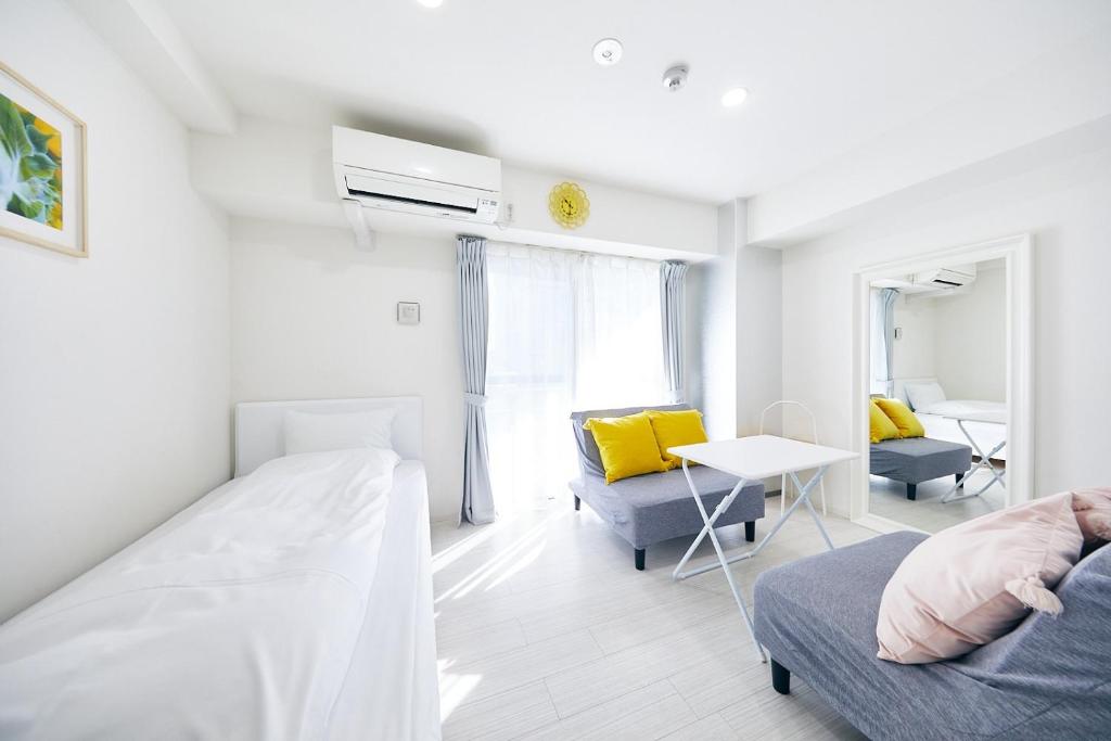 Кровать или кровати в номере MONTANA FLAT YEBISU / Vacation STAY 5949