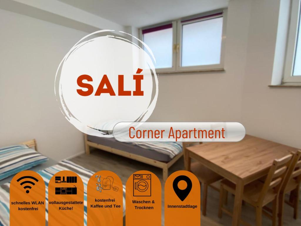 un cartel en una habitación con una mesa y un espejo en Sali Homes - 3BR Apartment with Kitchen, en Kleve