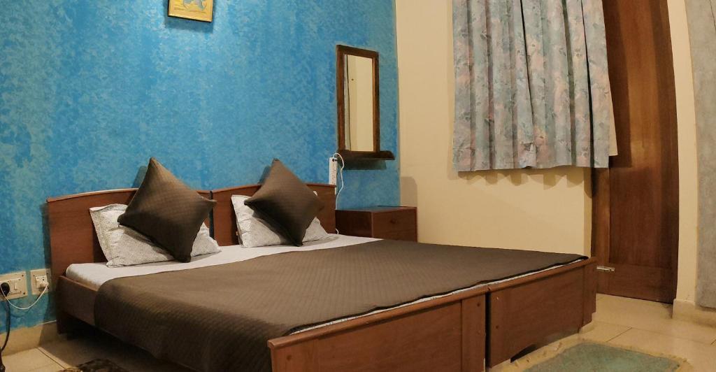 Postel nebo postele na pokoji v ubytování UVs Homestay