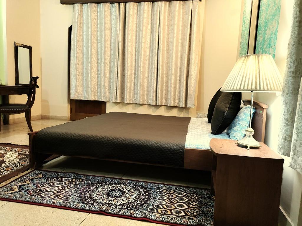 Postel nebo postele na pokoji v ubytování UVs Homestay