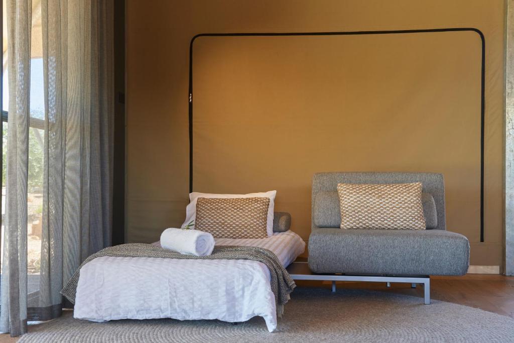 Postel nebo postele na pokoji v ubytování Olio Bello Lakeside Glamping