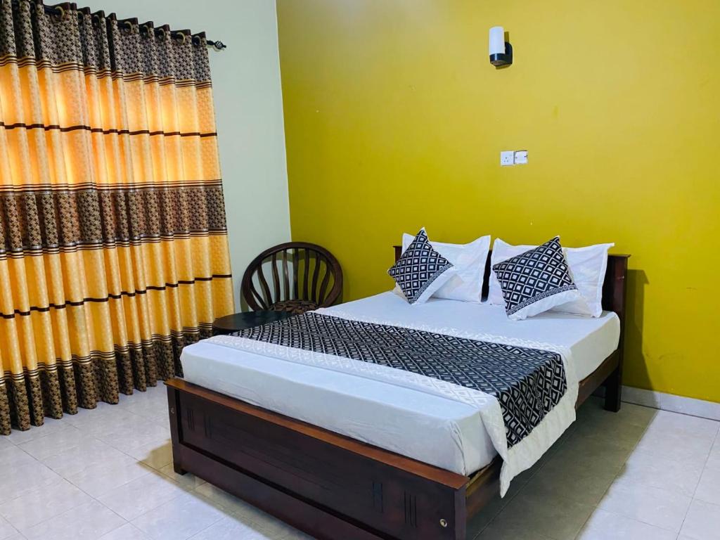 Postel nebo postele na pokoji v ubytování Crown Resort