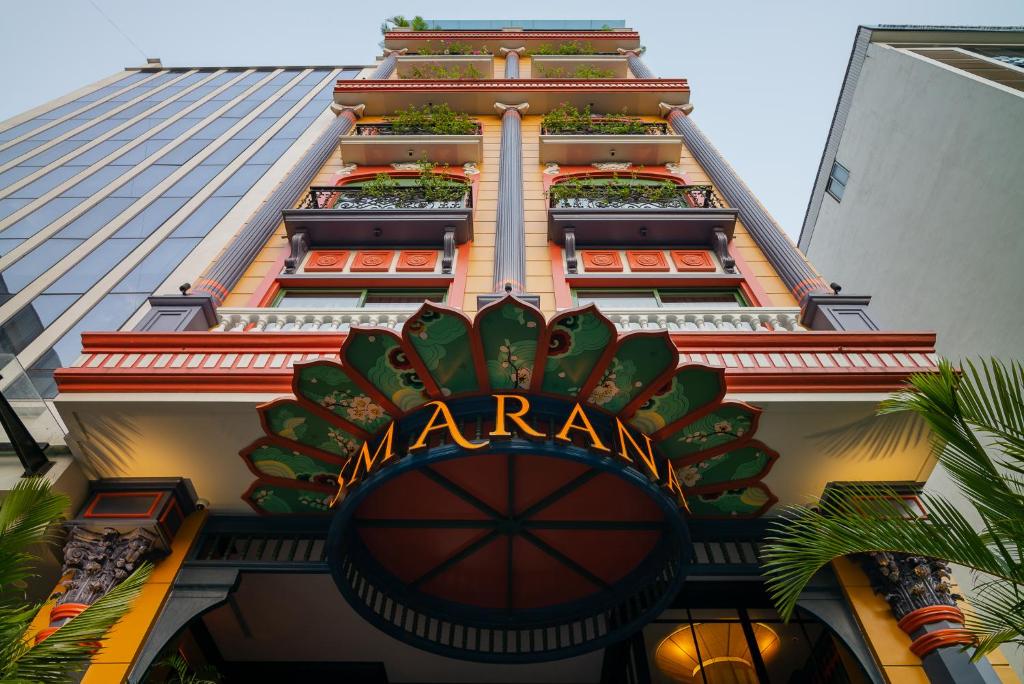 a large building with a marriott sign on it at SMARANA Hanoi HERITAGE in Hanoi