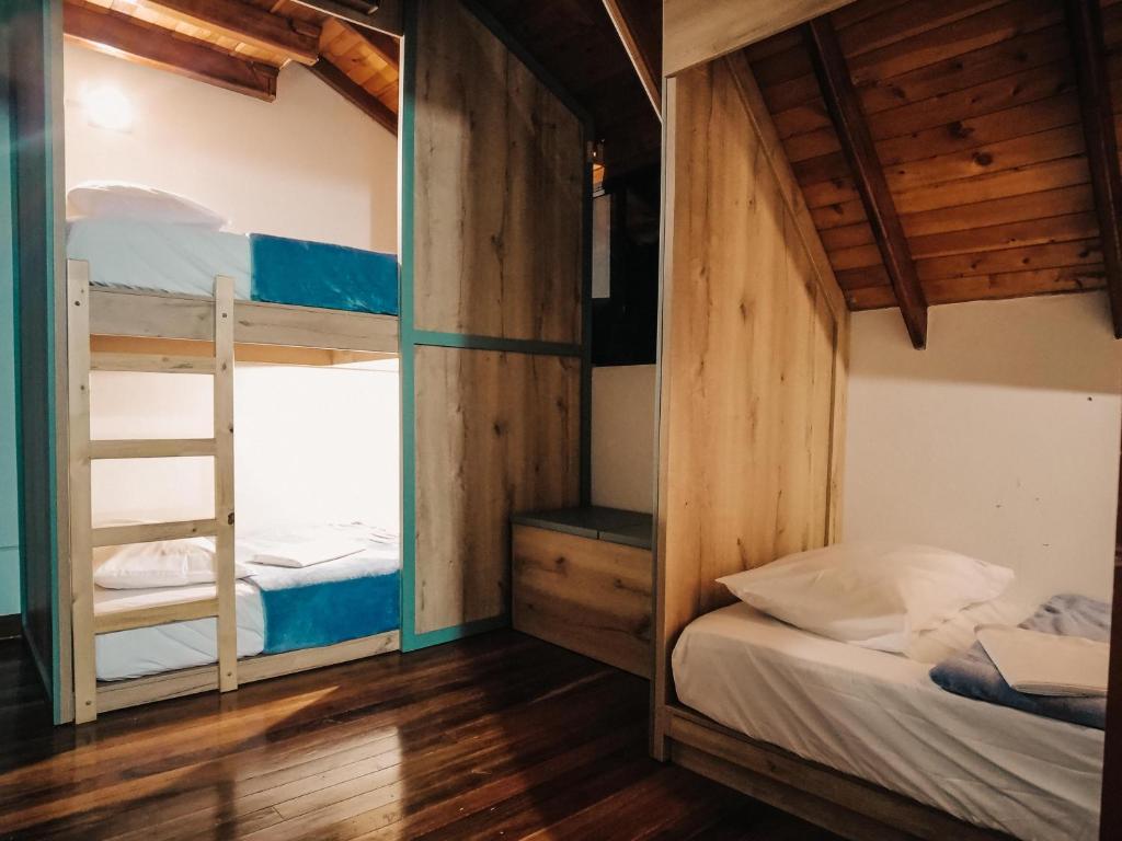 Postel nebo postele na pokoji v ubytování VOLARE Guatapé isla