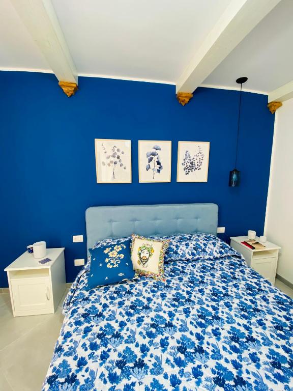 Postel nebo postele na pokoji v ubytování Casa 68 Ortigia
