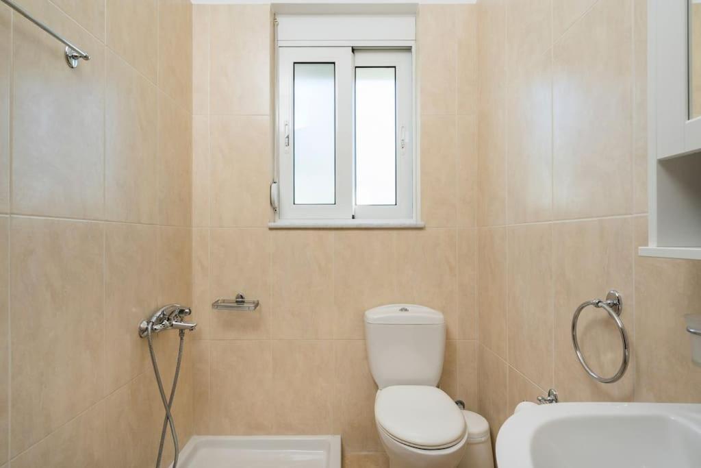 A bathroom at Charilena's luxury apartment
