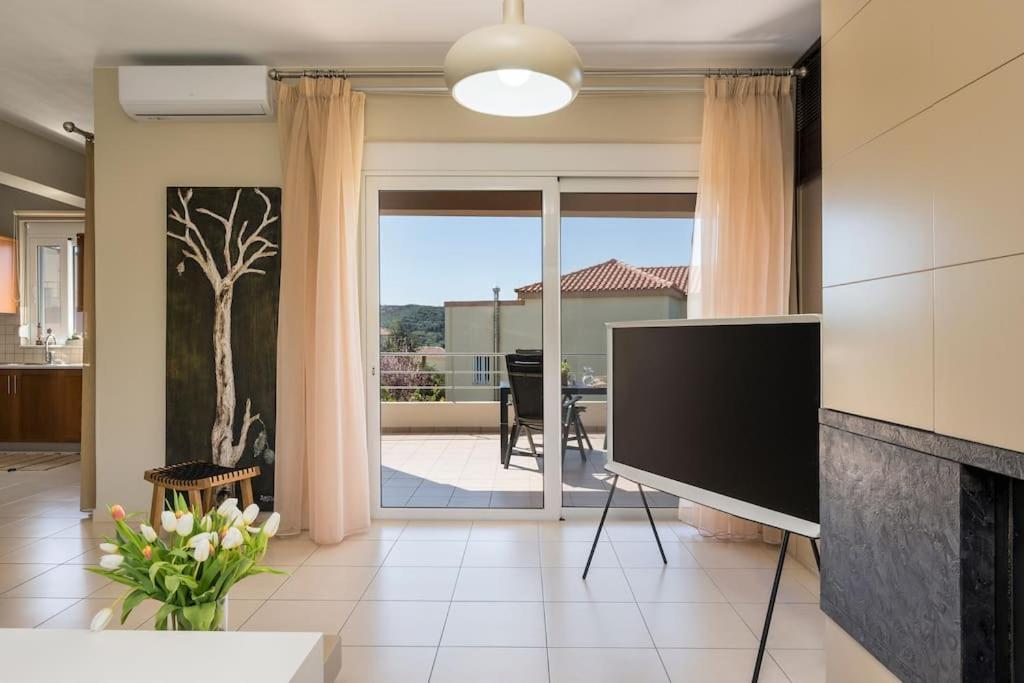 A television and/or entertainment centre at Charilena's luxury apartment