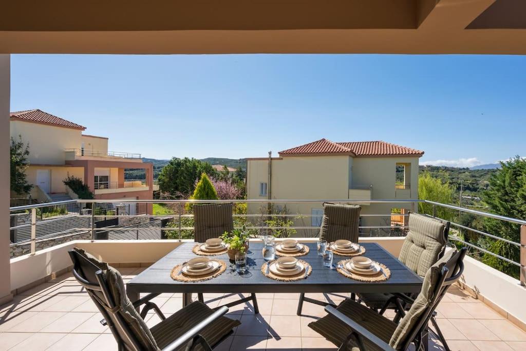 A balcony or terrace at Charilena's luxury apartment