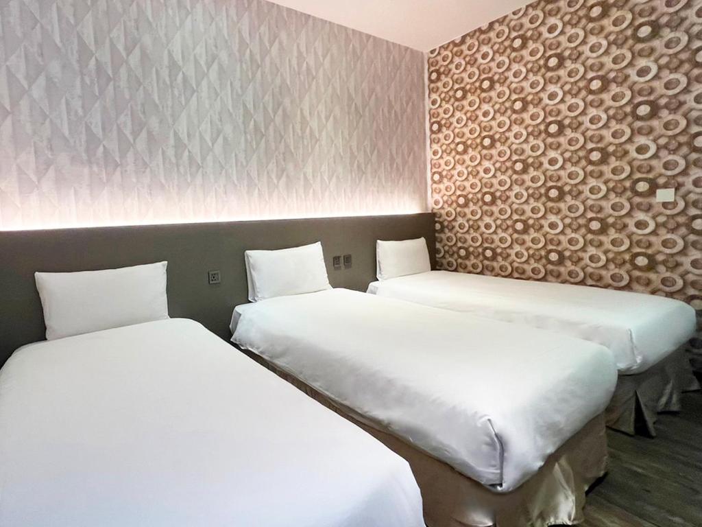 &#x7DBA;&#x6A02;&#x6587;&#x65C5; &#x6843;&#x5712;&#x9928; Le Room Hotel Taoyuan&#x623F;&#x9593;&#x7684;&#x5E8A;