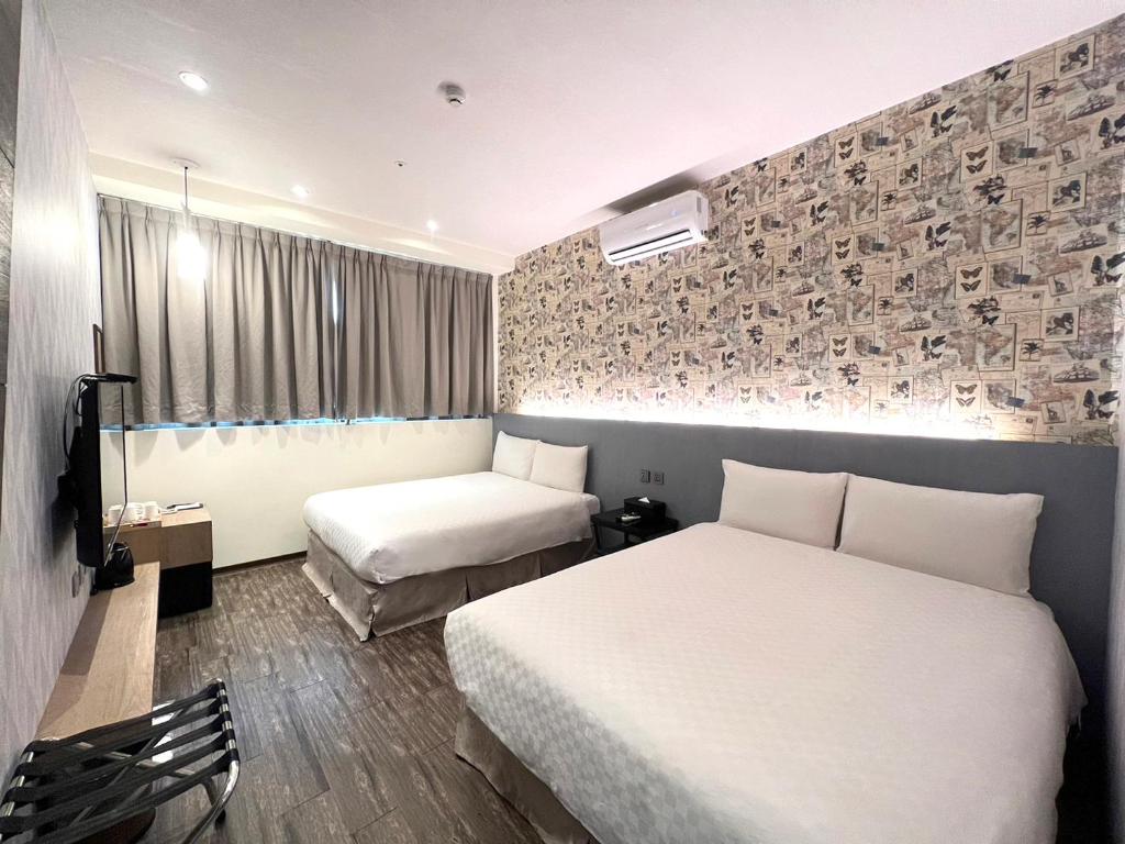 &#x7DBA;&#x6A02;&#x6587;&#x65C5; &#x6843;&#x5712;&#x9928; Le Room Hotel Taoyuan&#x623F;&#x9593;&#x7684;&#x5E8A;