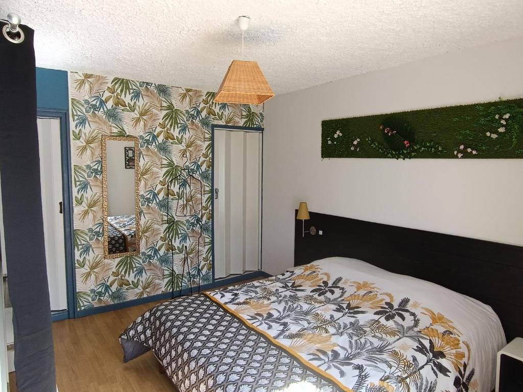 Postel nebo postele na pokoji v ubytování Auberge du botaniste