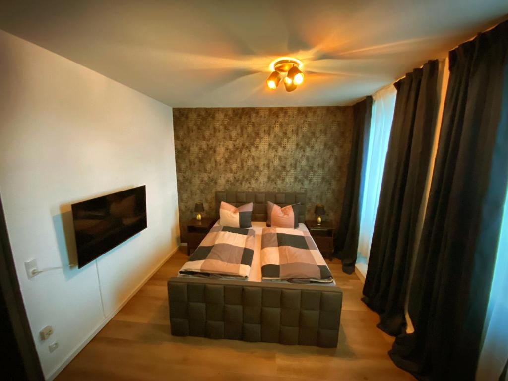 Ένα ή περισσότερα κρεβάτια σε δωμάτιο στο Flat Hundertwasser
