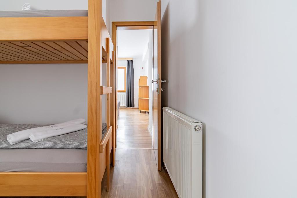 Postel nebo postele na pokoji v ubytování Ribniška koča