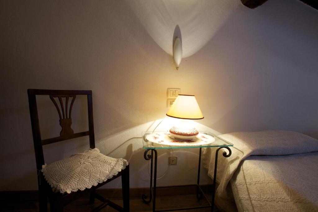 Postel nebo postele na pokoji v ubytování Camere Carli