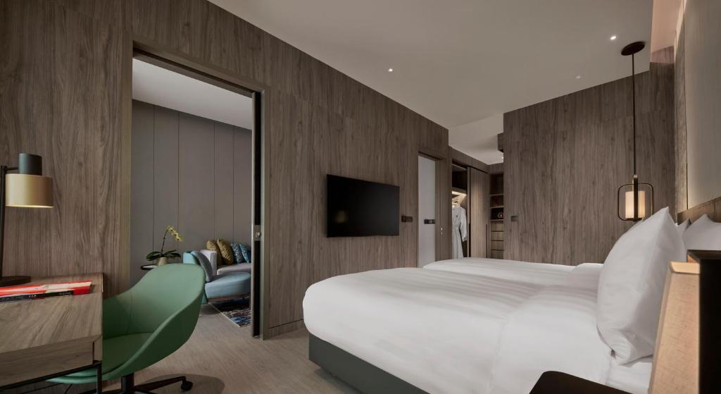TV a/nebo společenská místnost v ubytování Pan Pacific Serviced Suites Kuala Lumpur