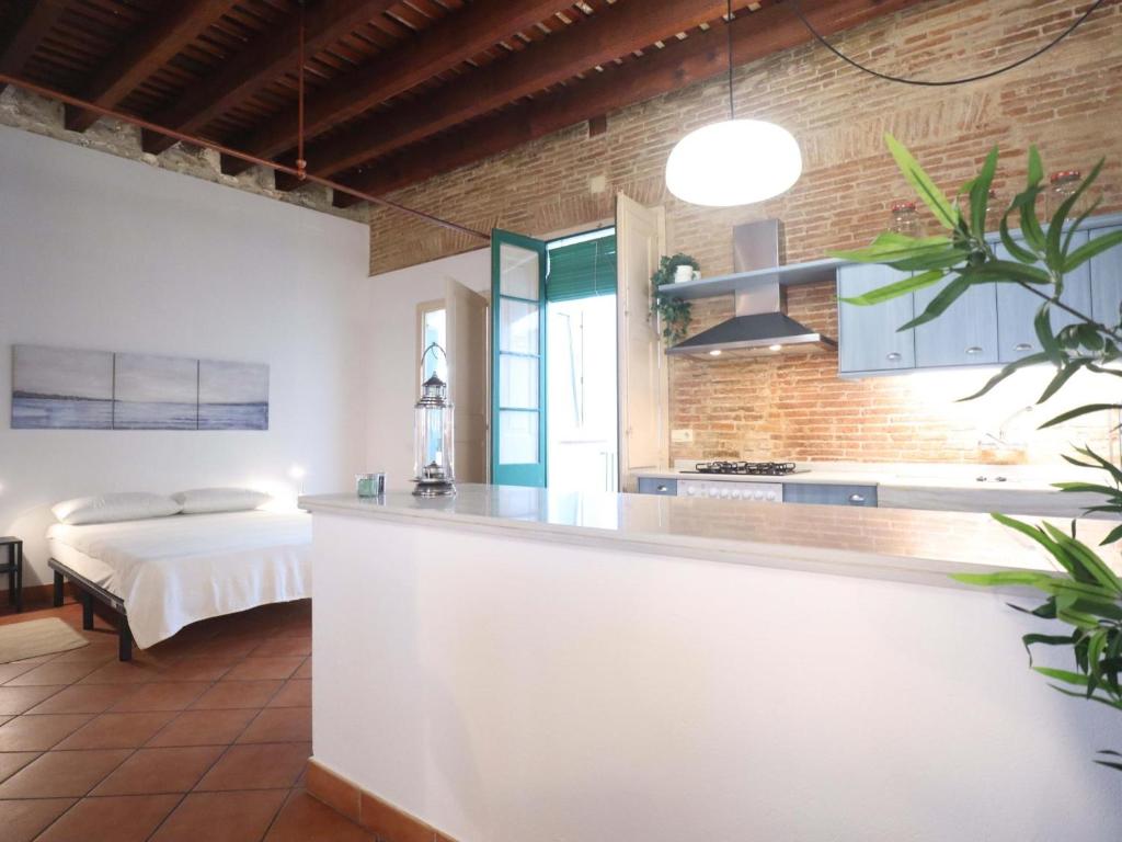 A bed or beds in a room at Loft Algavira