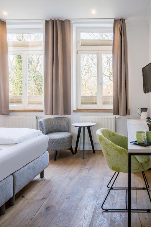 Postel nebo postele na pokoji v ubytování Parkhotel Wangerooge