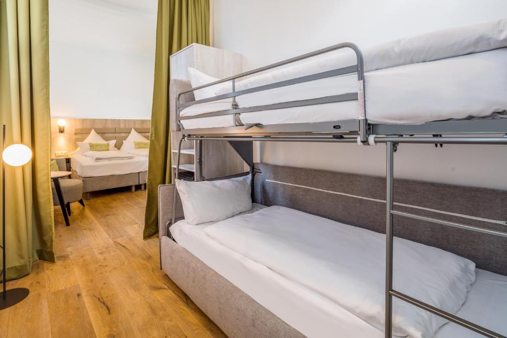 Postel nebo postele na pokoji v ubytování Parkhotel Wangerooge