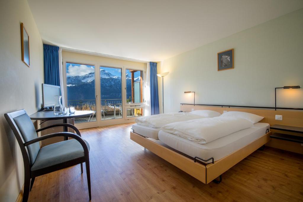 Postel nebo postele na pokoji v ubytování Hotel Panorama