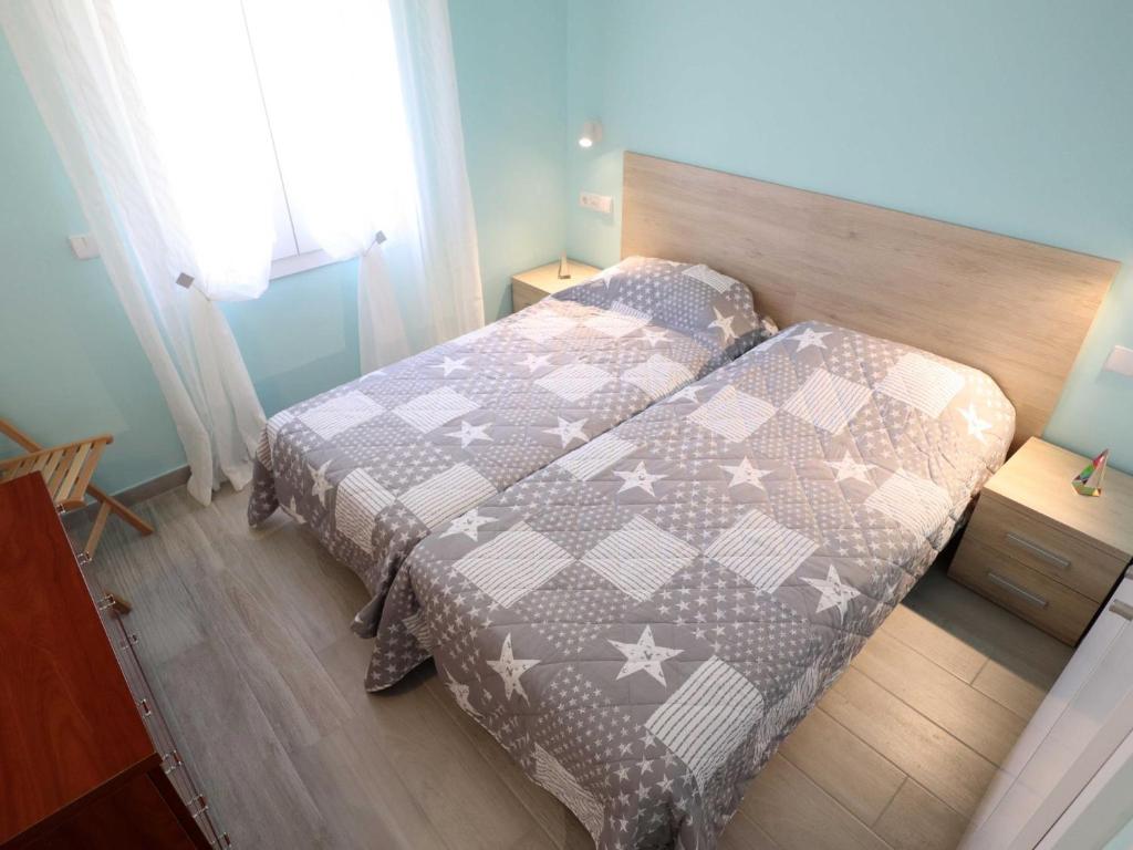 Postel nebo postele na pokoji v ubytování QUINTA SANT POL Apto 6 pax a 50 metros mar E29047