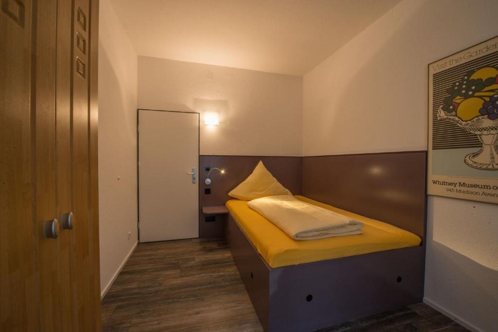 Postel nebo postele na pokoji v ubytování Hotel Scheffelhof