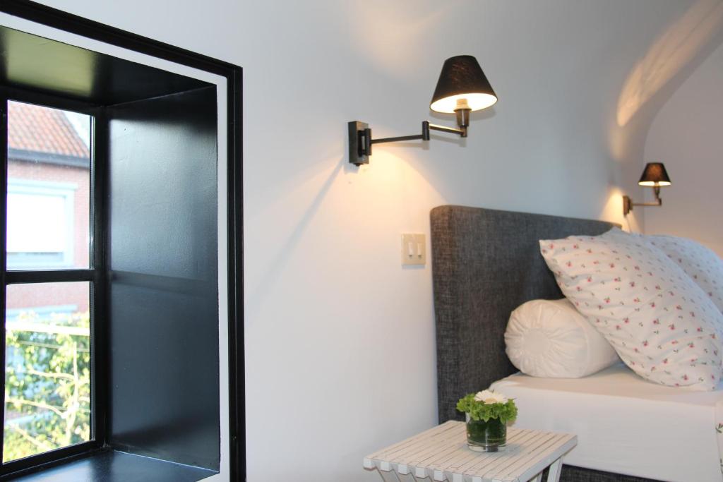 Postel nebo postele na pokoji v ubytování Guesthouse Villa Vauban