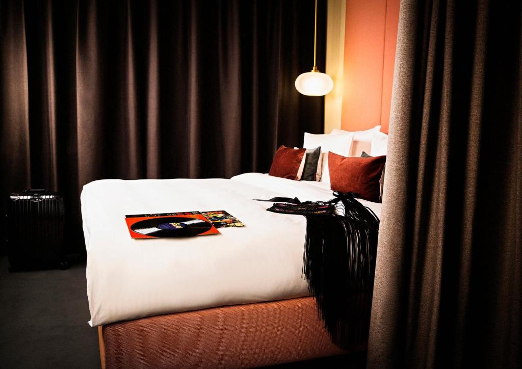 Postel nebo postele na pokoji v ubytování Design-Hotel JAMS