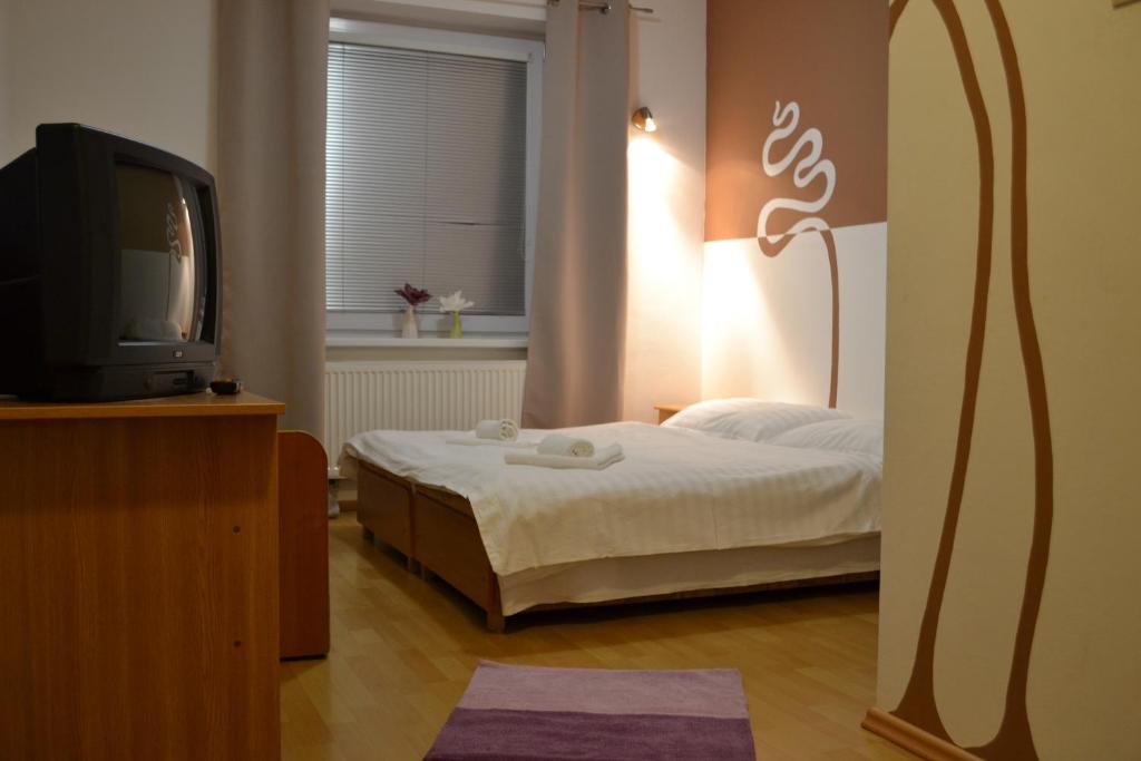 Postel nebo postele na pokoji v ubytování Privat Julia