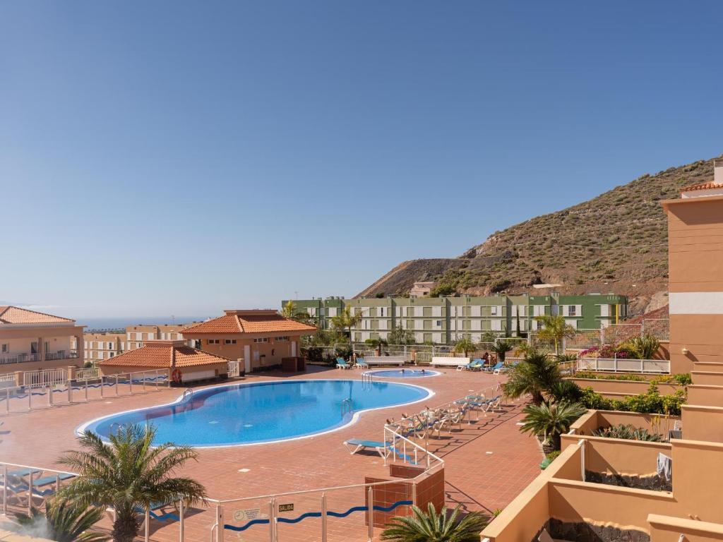 Bazén v ubytování Sea Breezes Costa Adeje nebo v jeho okolí