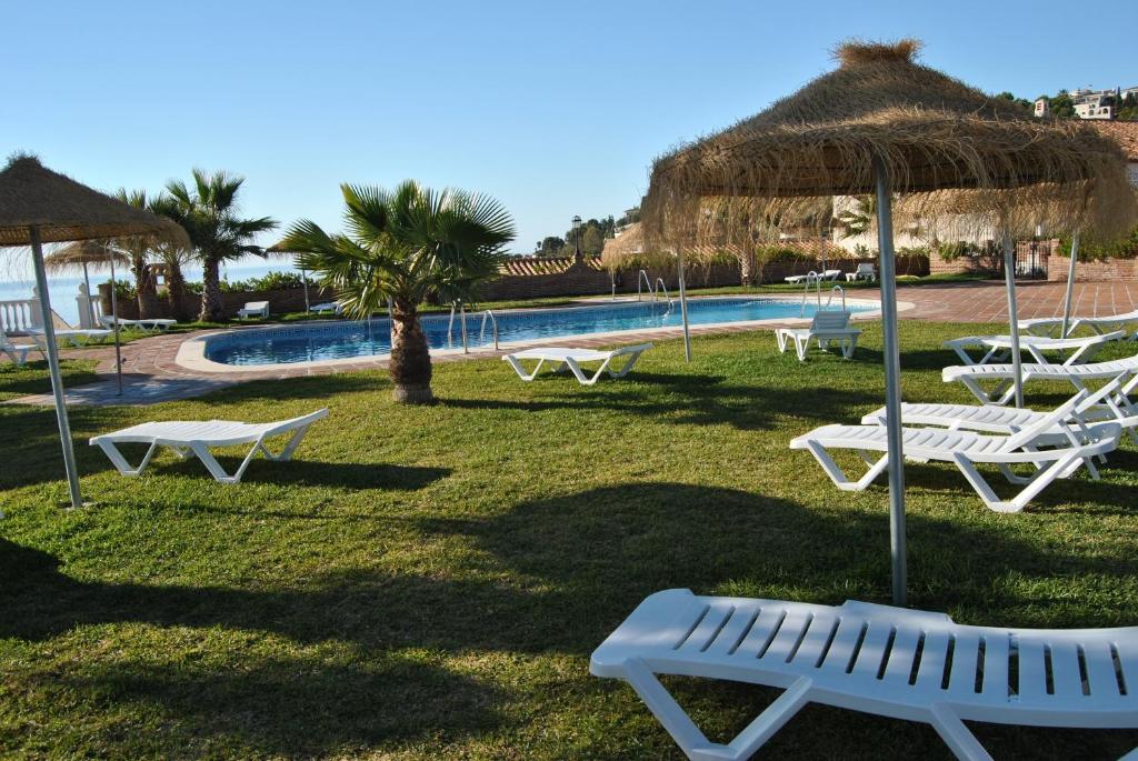 The swimming pool at or close to Casas Adosadas Lambda