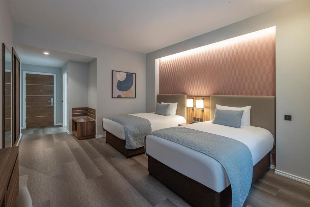 Voodi või voodid majutusasutuse Riu Plaza The Gresham Dublin toas