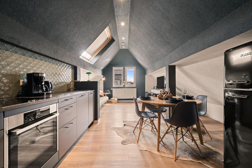 Η κουζίνα ή μικρή κουζίνα στο Loft im Herzen von Friedrichshafen - klimatisiert