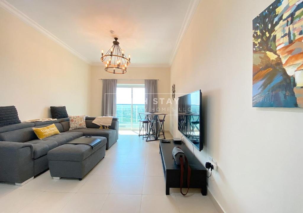 Comfortable 1BR apartment in Dubai Sports City by Rich Stay, Dubai