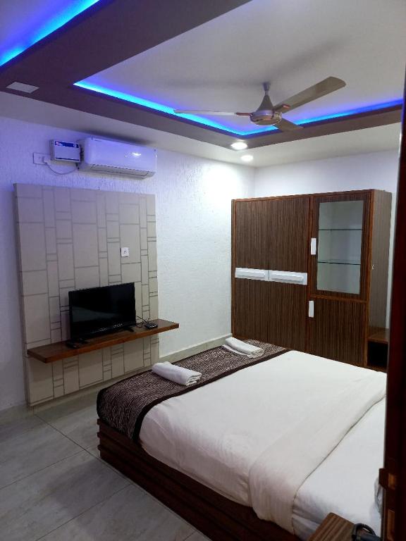 Postel nebo postele na pokoji v ubytování Hotel Calangute Central