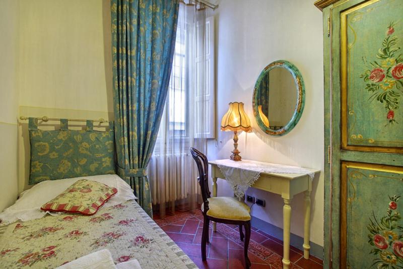 Łóżko lub łóżka w pokoju w obiekcie Pergola Apartment
